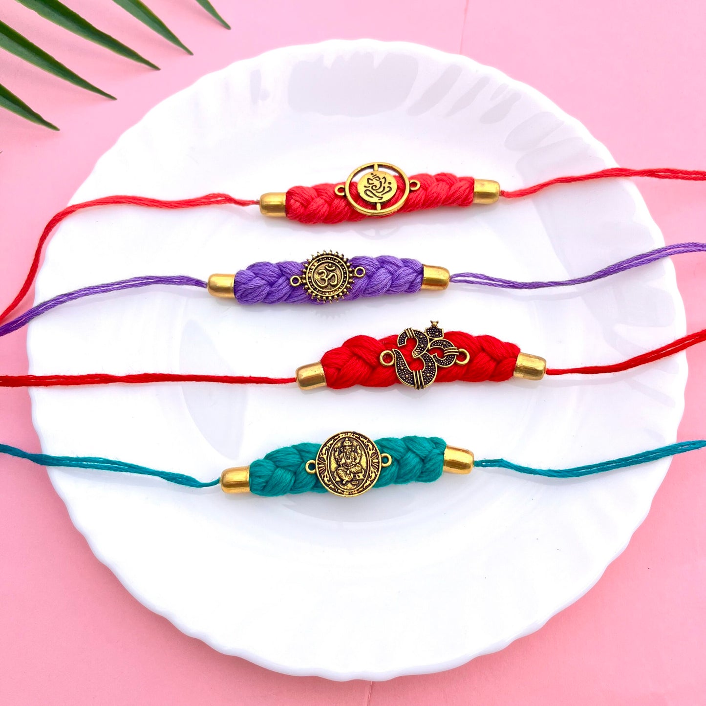 Thread & charm Rakhis image 0
